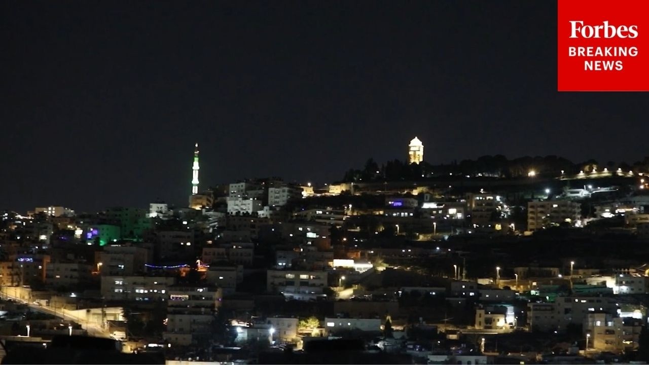 Air Raid Sirens Blare Across Jerusalem As Missile Fire Lights Up Night Sky