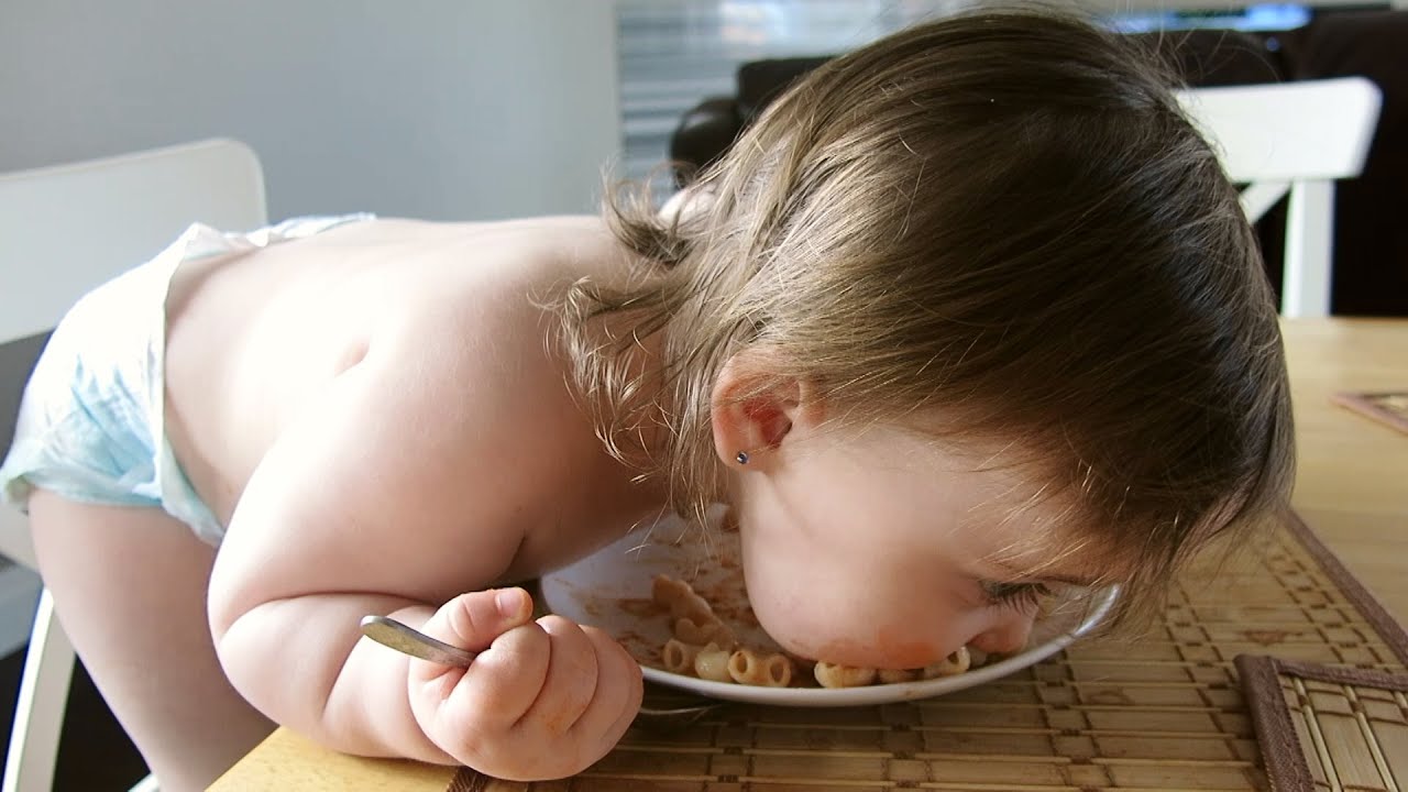 Canadian Baby eating pasta like Doggy