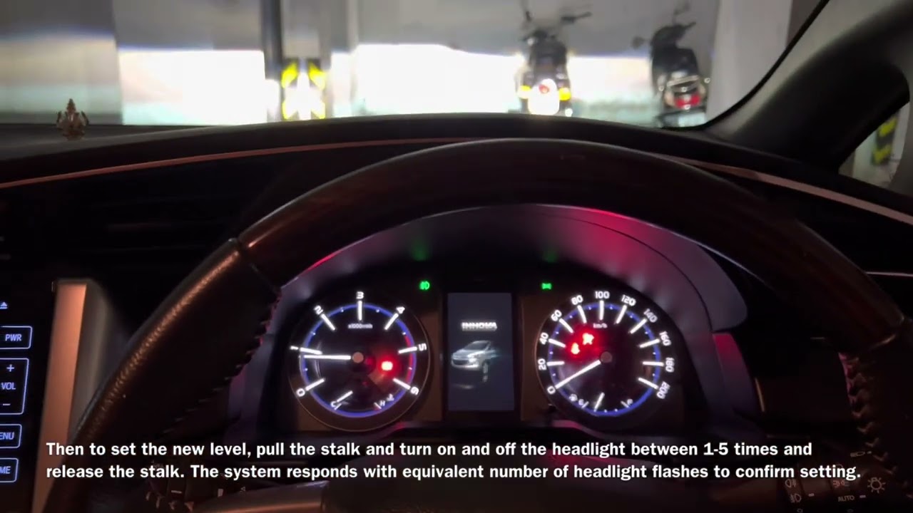 Innova Crysta Auto headlight sensitivity level adjust