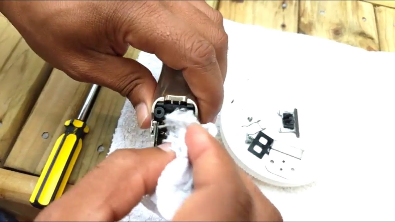 manutenção na maquina de acabamento andis slimline pro li bivolt