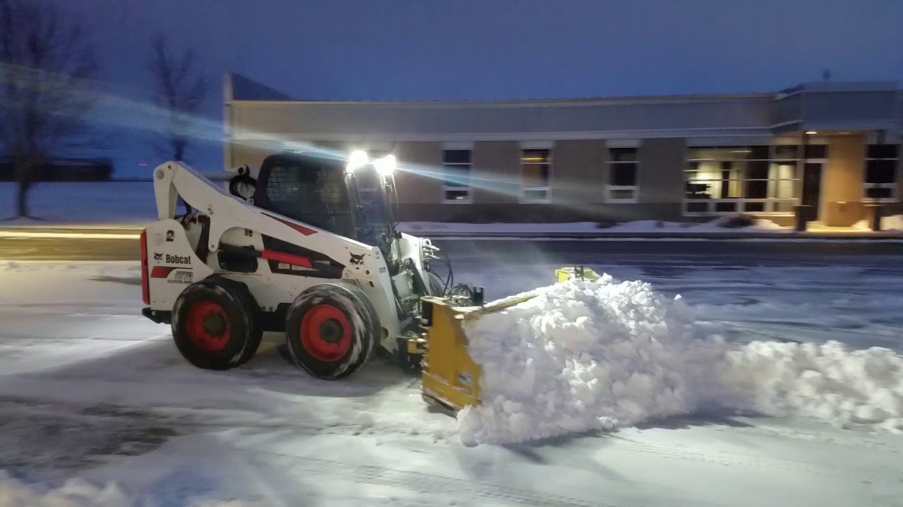 Bobcat A770 and HLA snow wing Bobcat toolcat and sweeper