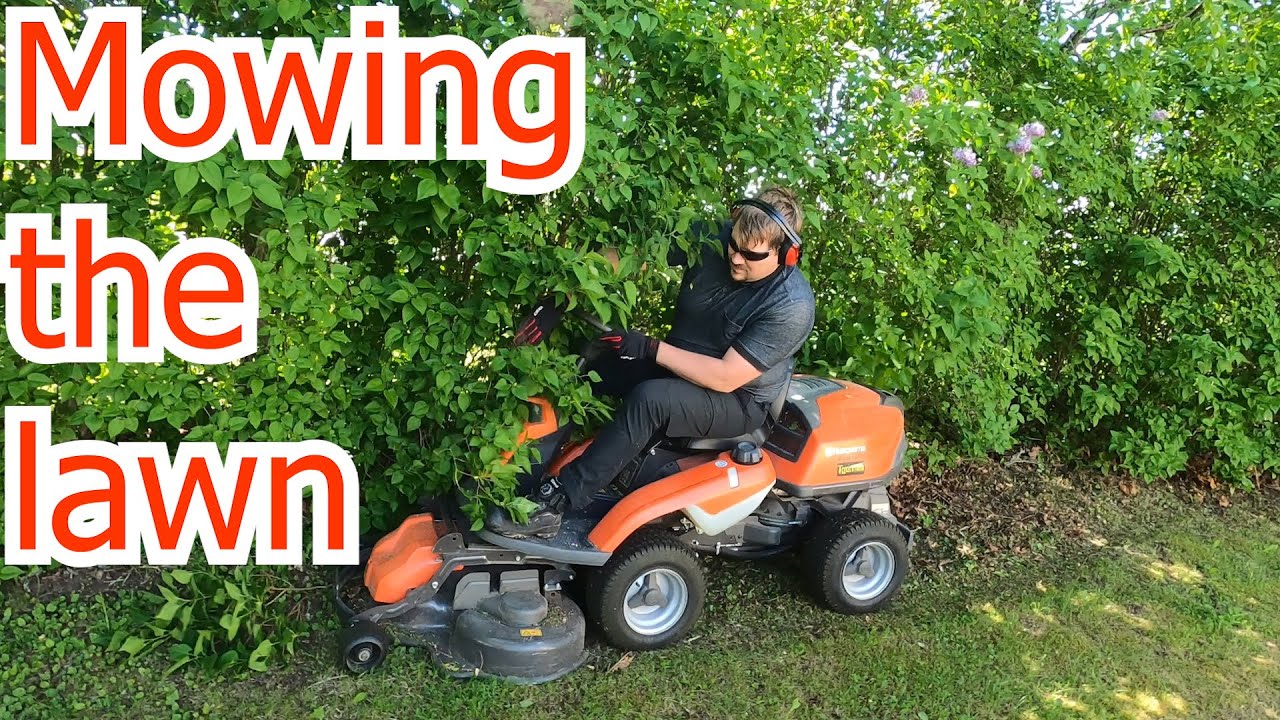 Mowing the lawn using our husqvarna r 216 awd