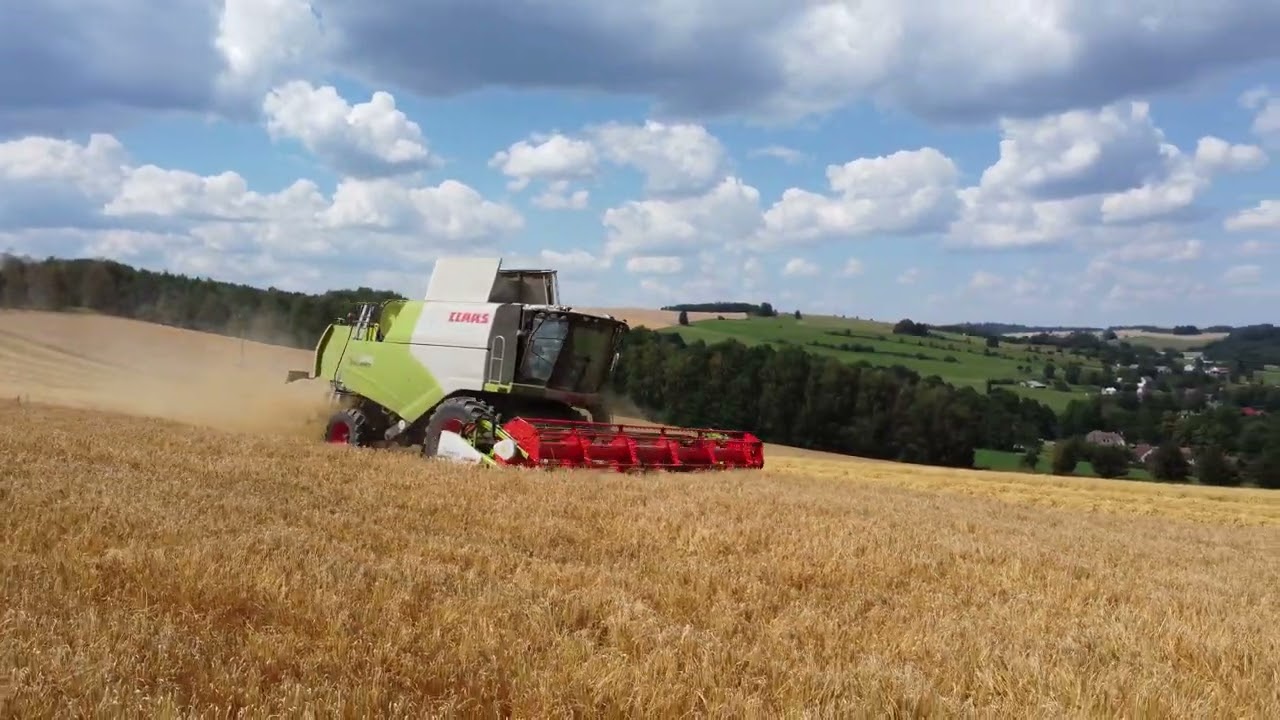 Žně Claas Tucano 570