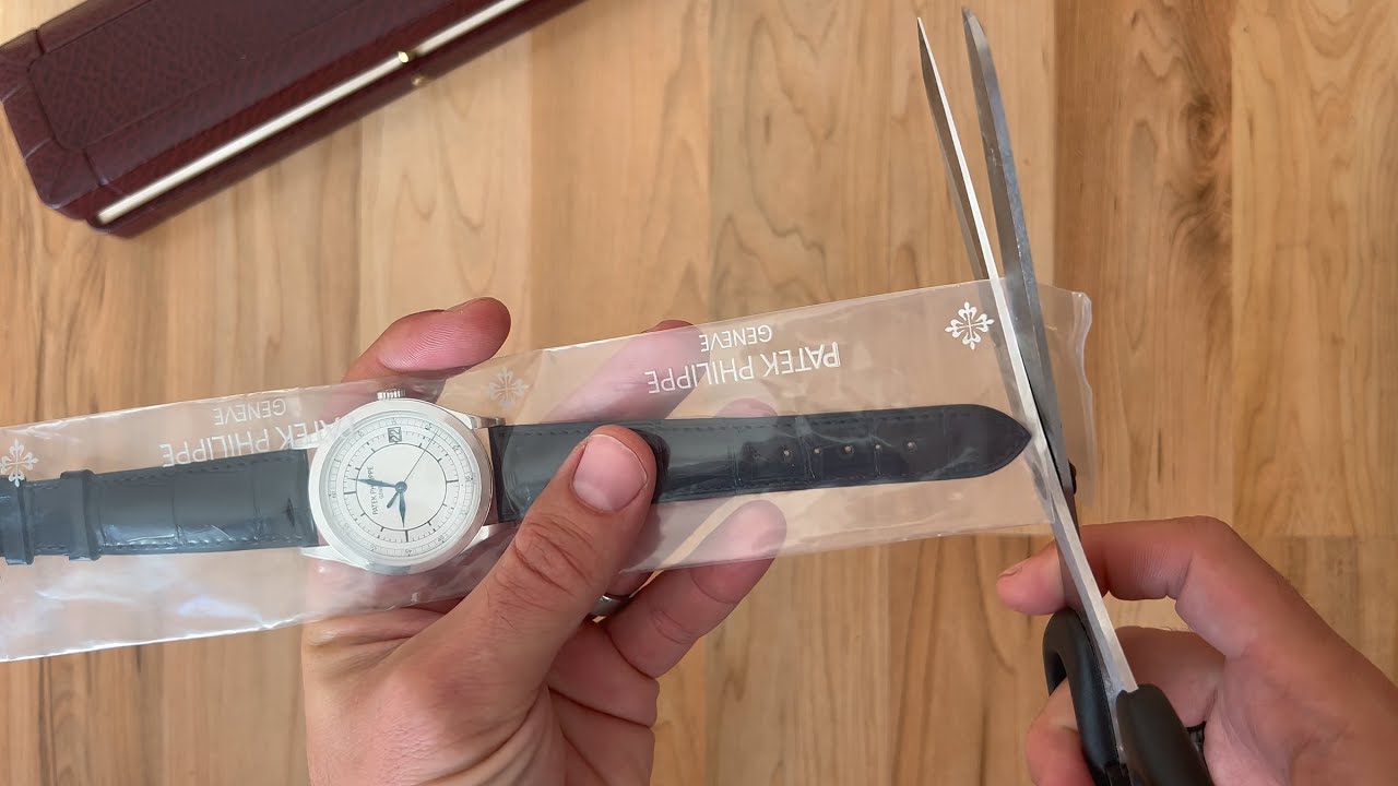 Unboxing a completely sealed Patek Philippe Calatrava 5296G-001 with sector dial