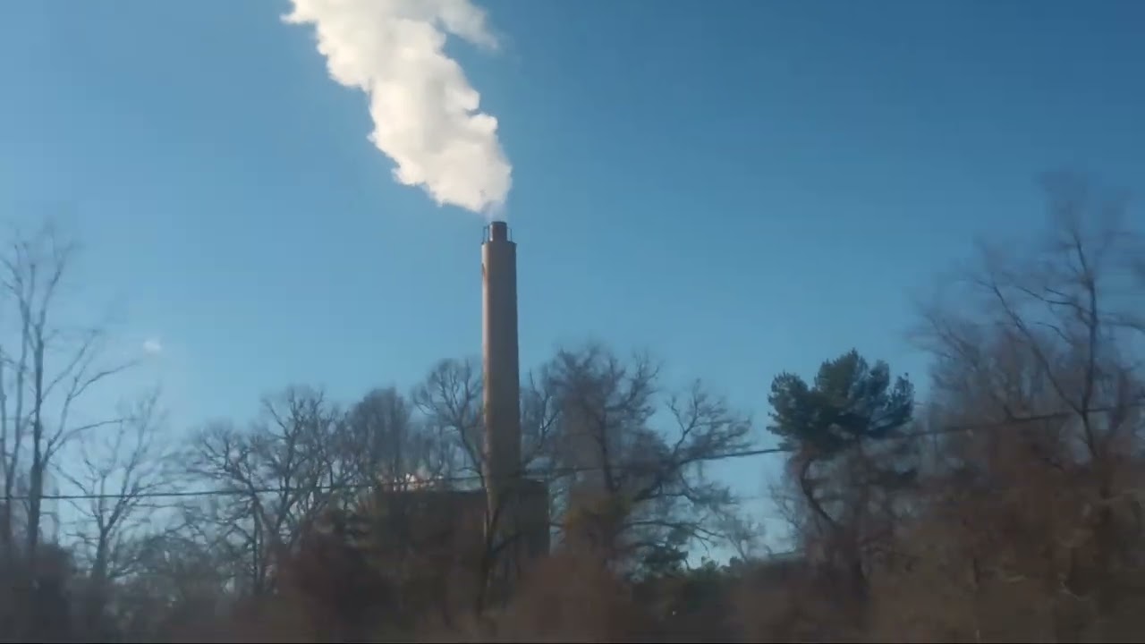 BUS RIDE OVER MIGHTY THE FROZEN THAMES RIVER AND SNOW , PAST THE INCINERATOR AND CASINO