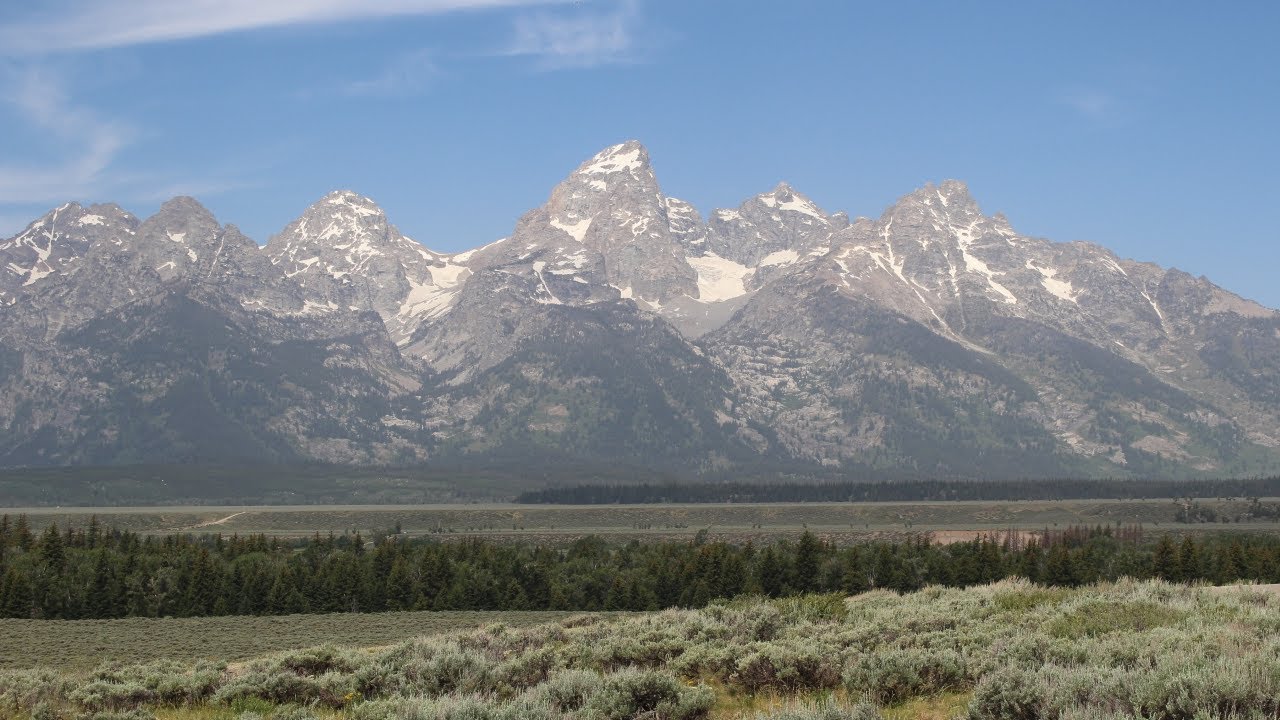 Grand Teton National Park, Fly Fishing the Snake River, face-to-face encounter with spyhopping otter