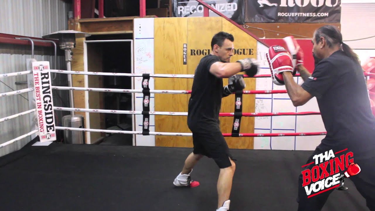 Robert “The Ghost” Guerrero Doing Pad work Looking Focused and Ready