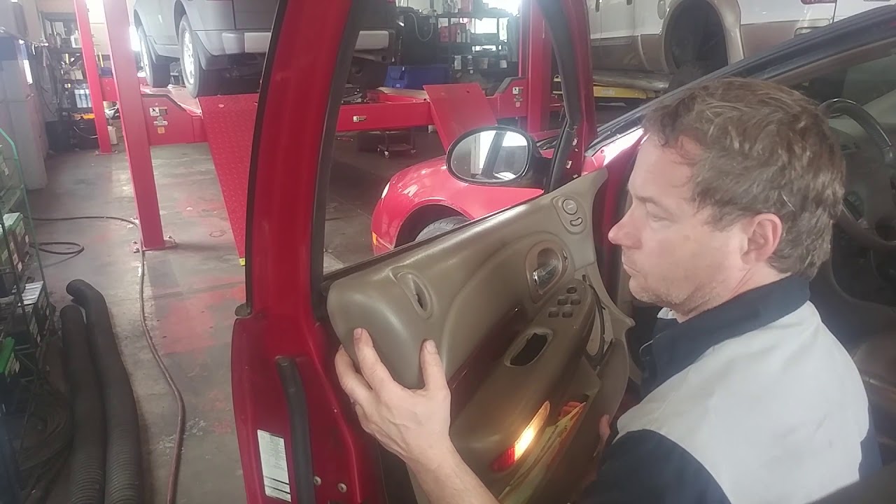 Inside drivers door handle replacement 2001 Chrysler 300M.  Door panel.