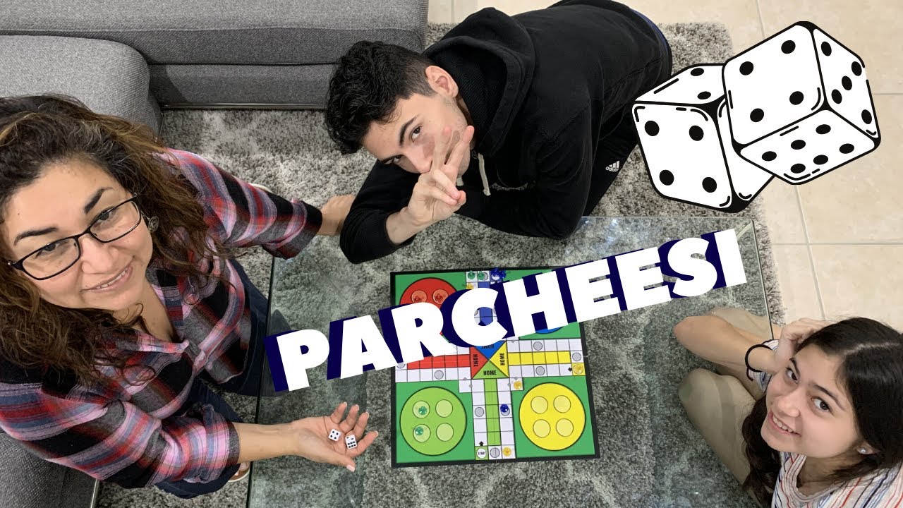 PLAYING PARCHEESI