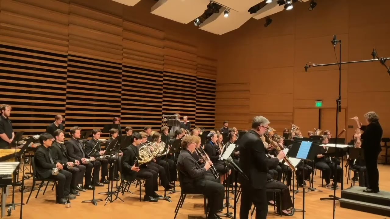 Ocean of Undiscovered Truth for soprano saxophone and wind ensemble by Roger Zare