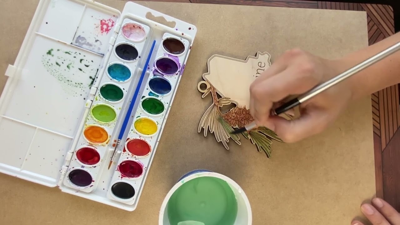 Watercolor Application on Laser Cut State Ornaments