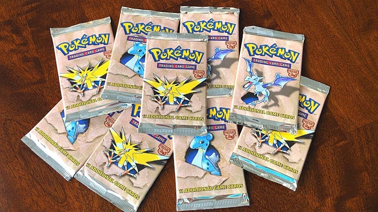 WEIGHING FOSSIL PACKS!! CAN LIGHT POKÉMON PACKS HAVE HOLOS?