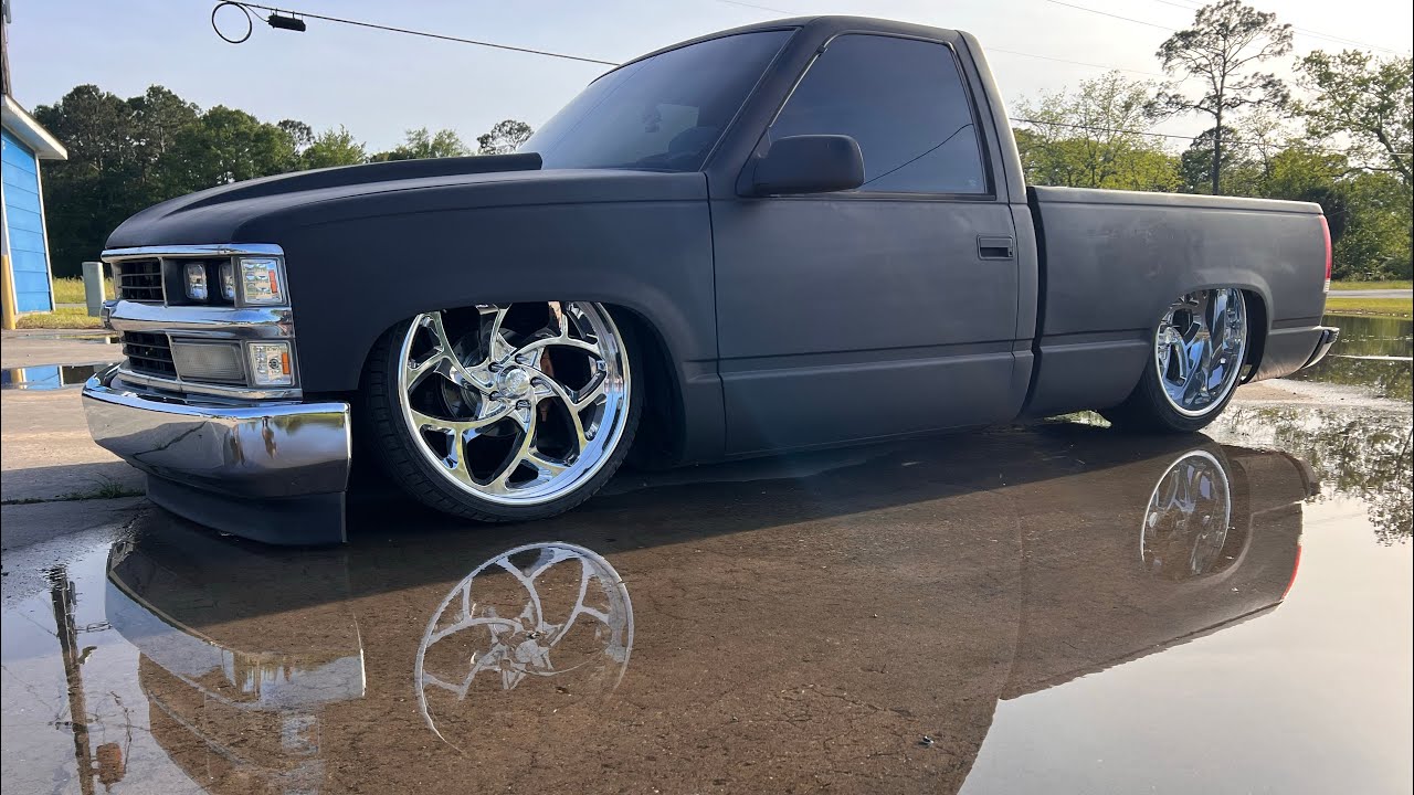 Tuckin 24x12s on a bagged 88-98 Silverado…narrowing axle and Lil Shop Mfg disc brake kit.