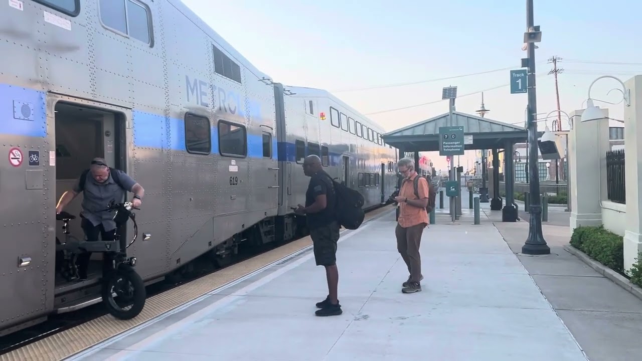 The arrival and departure of metrolink 824 at Orange train station on 8/13/25