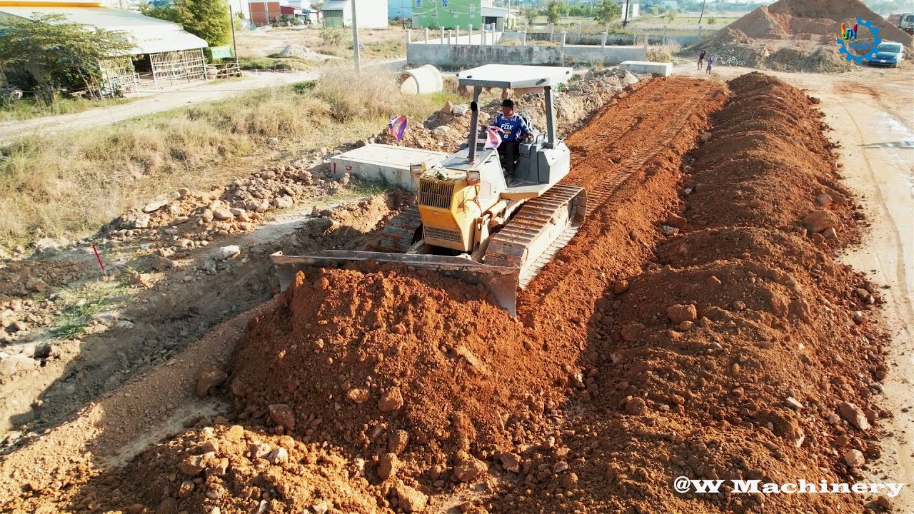 Nicely Mixing Action Dozer Pushing Rocks Soil Installing Foundation Roads & Dump Truck Dumping Soil