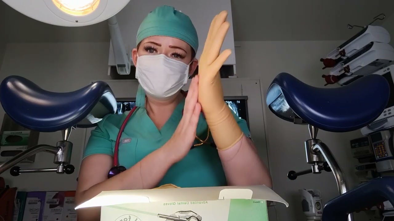 Putting on Biogel D advanced dental gloves.