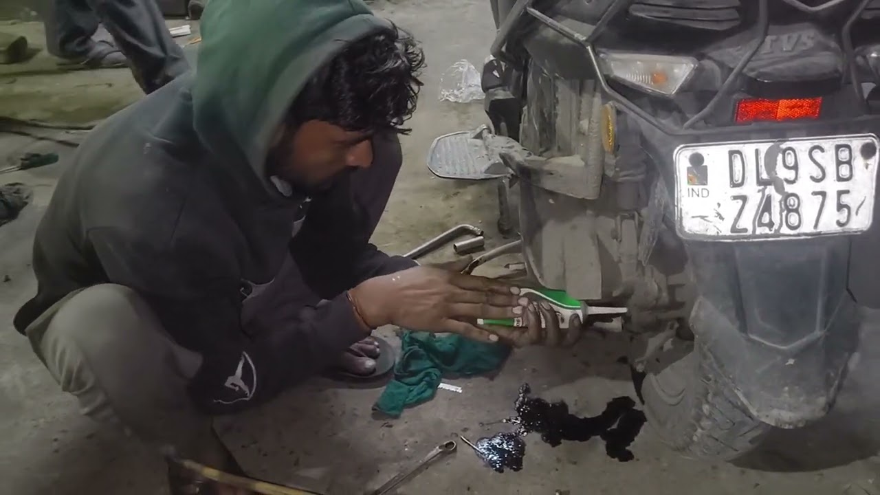 Scooty service engine oil change