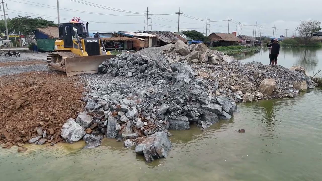 Interestingly SHANTUI Bulldozer Pushing Stone Into Water With 10 Wheel Dump Trucks Transport Stone