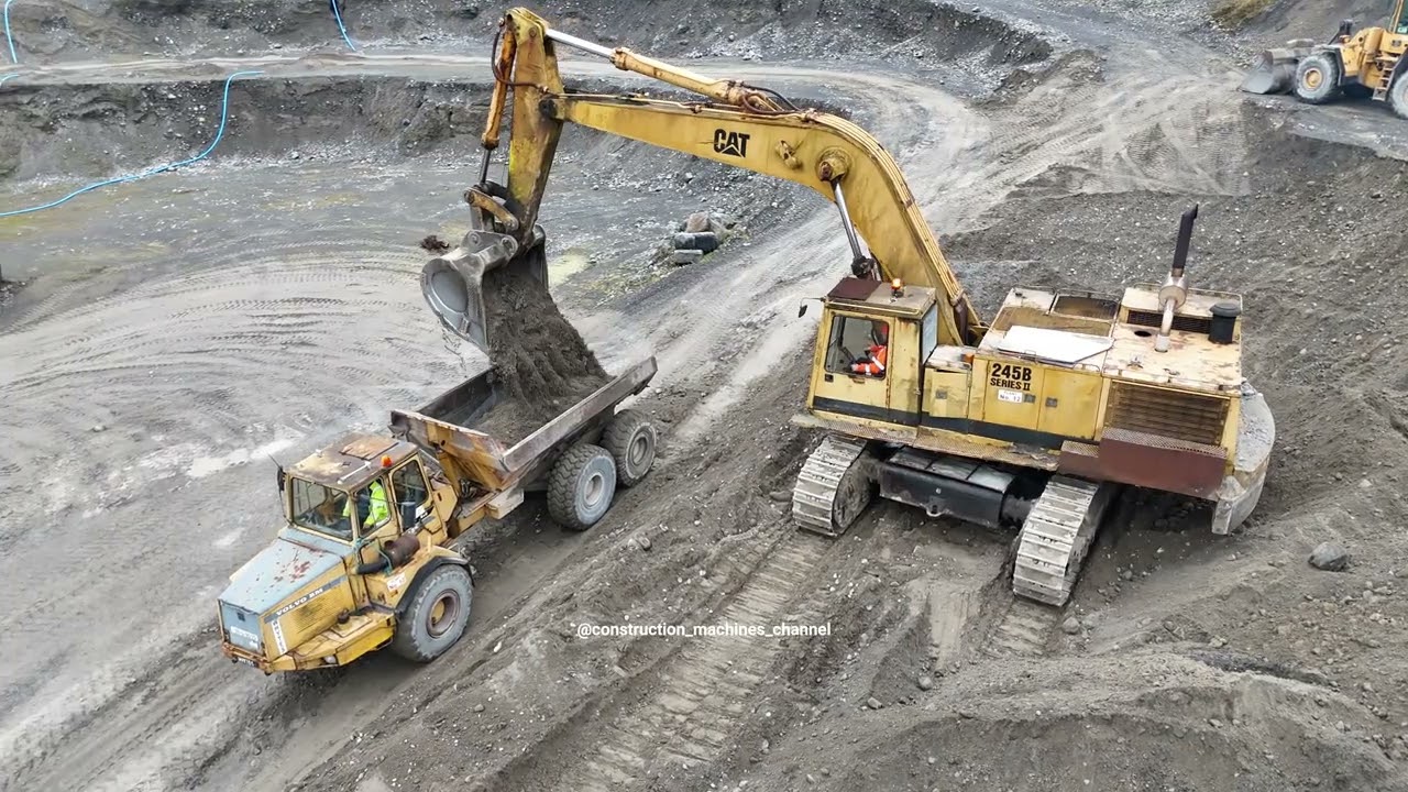 Caterpillar 245 excavator working