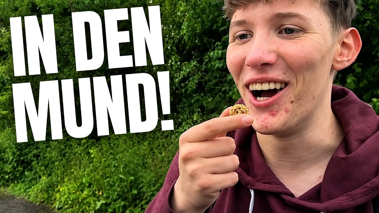 BALL IN DEN MUND SCHIEBEN