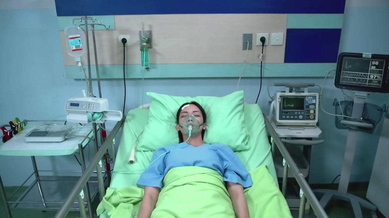 Woman with Oxygen Mask