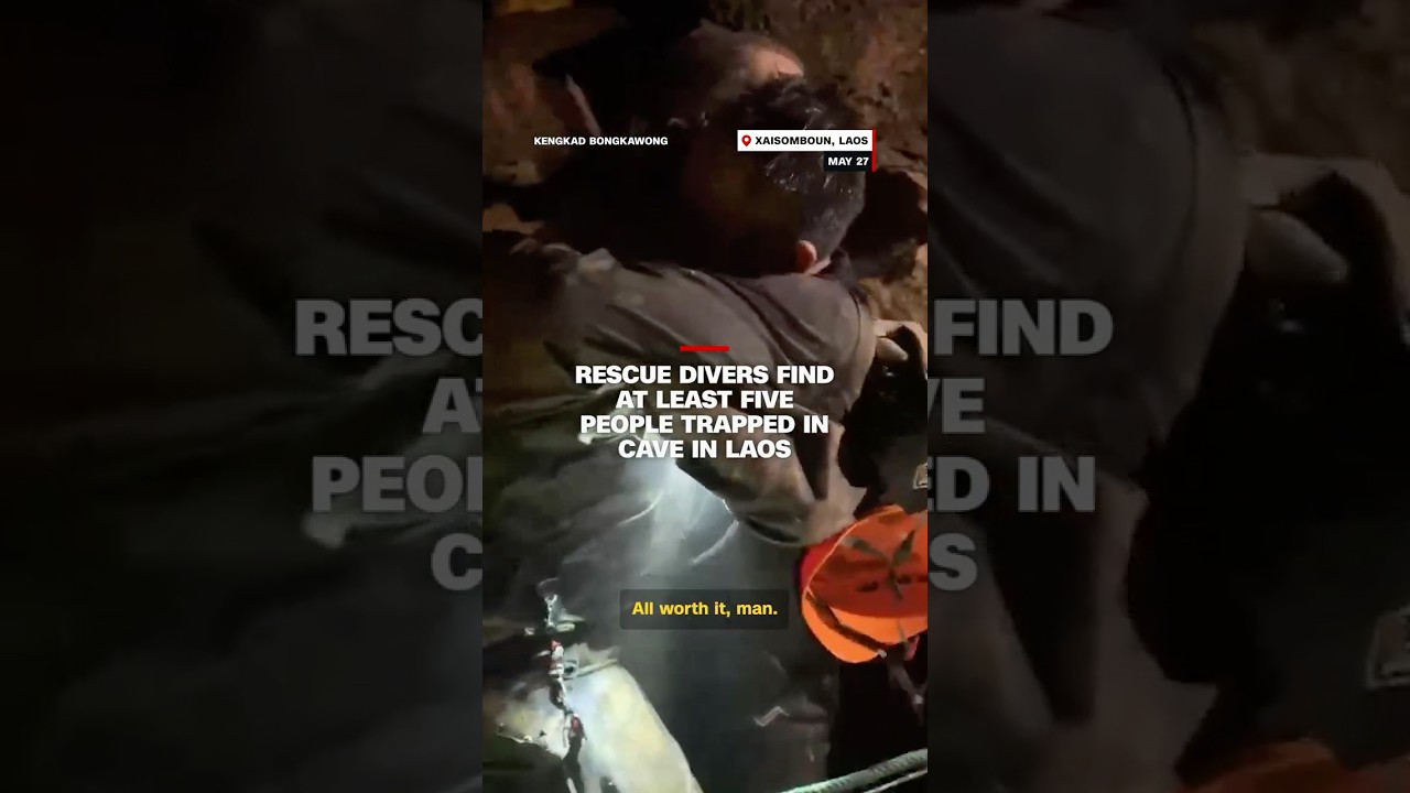 Rescue divers find at least five people trapped in cave in Laos