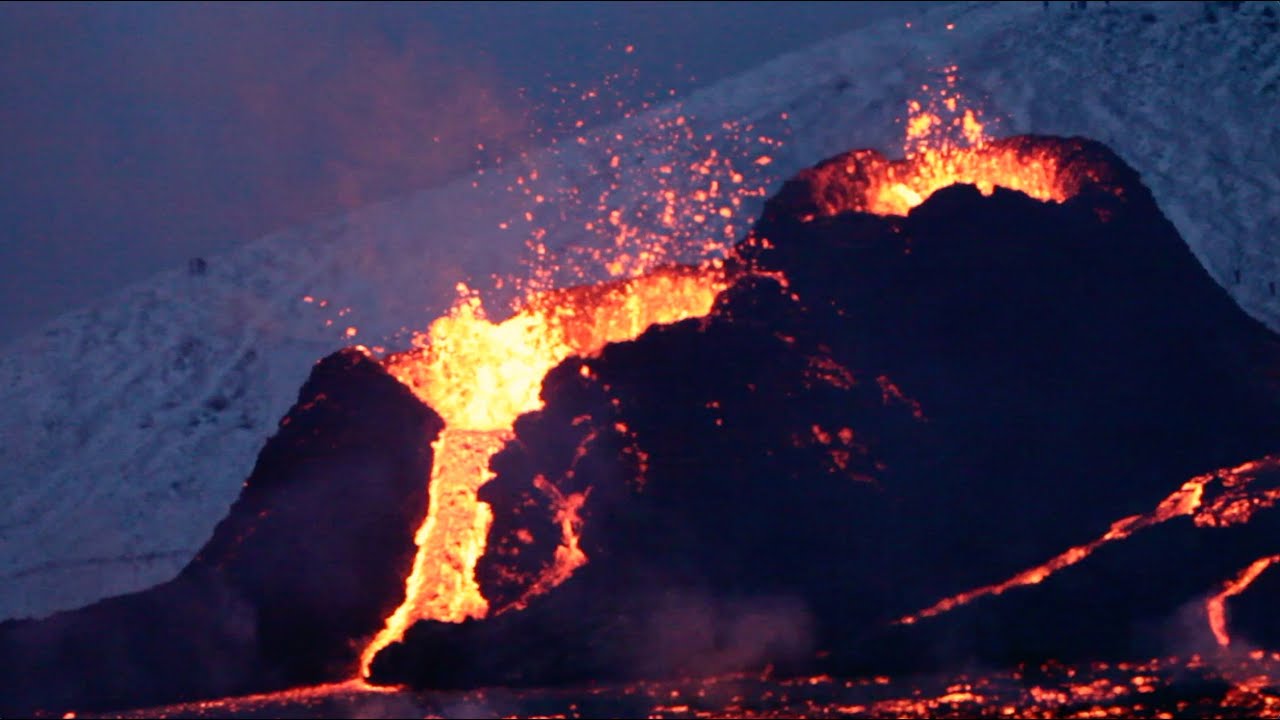 Volcano spewing in twilight - Iceland 2021