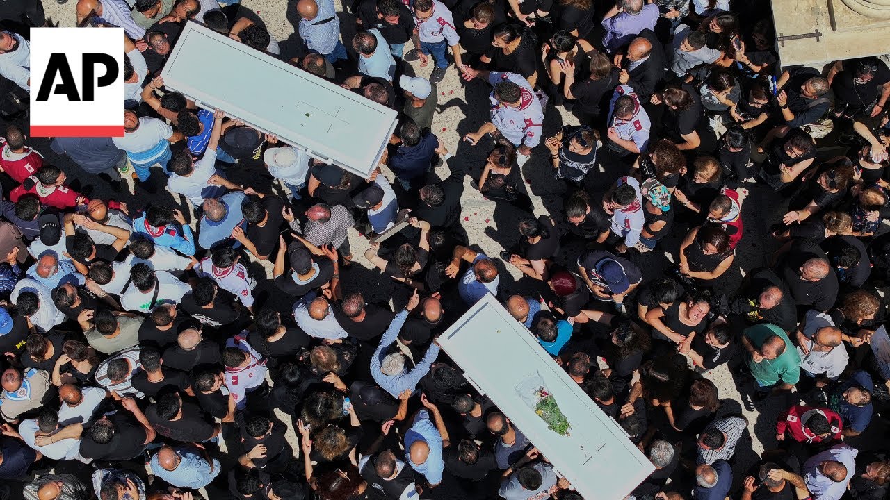Funerals held for victims in suicide bomb attack on a Greek Orthodox church in Syria