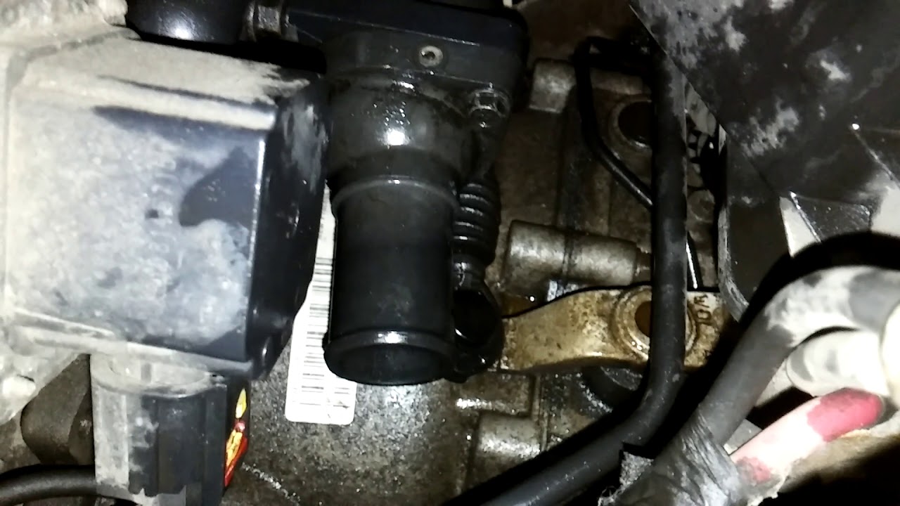 2009 Dodge Caliber cómo cambiar el termostato.