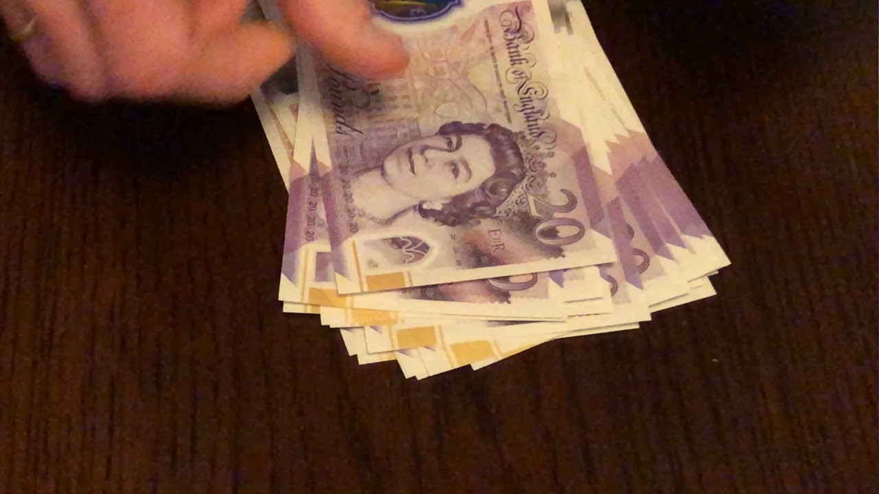 60 fps 4k - Counting out &pound;20 notes and presenting to camera