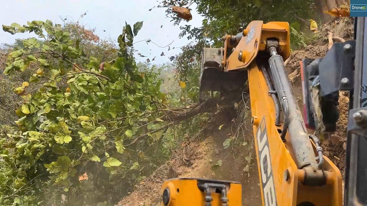 Challenging Work by Steep Mountainside-New Rural Mountain Road to Connect Villages