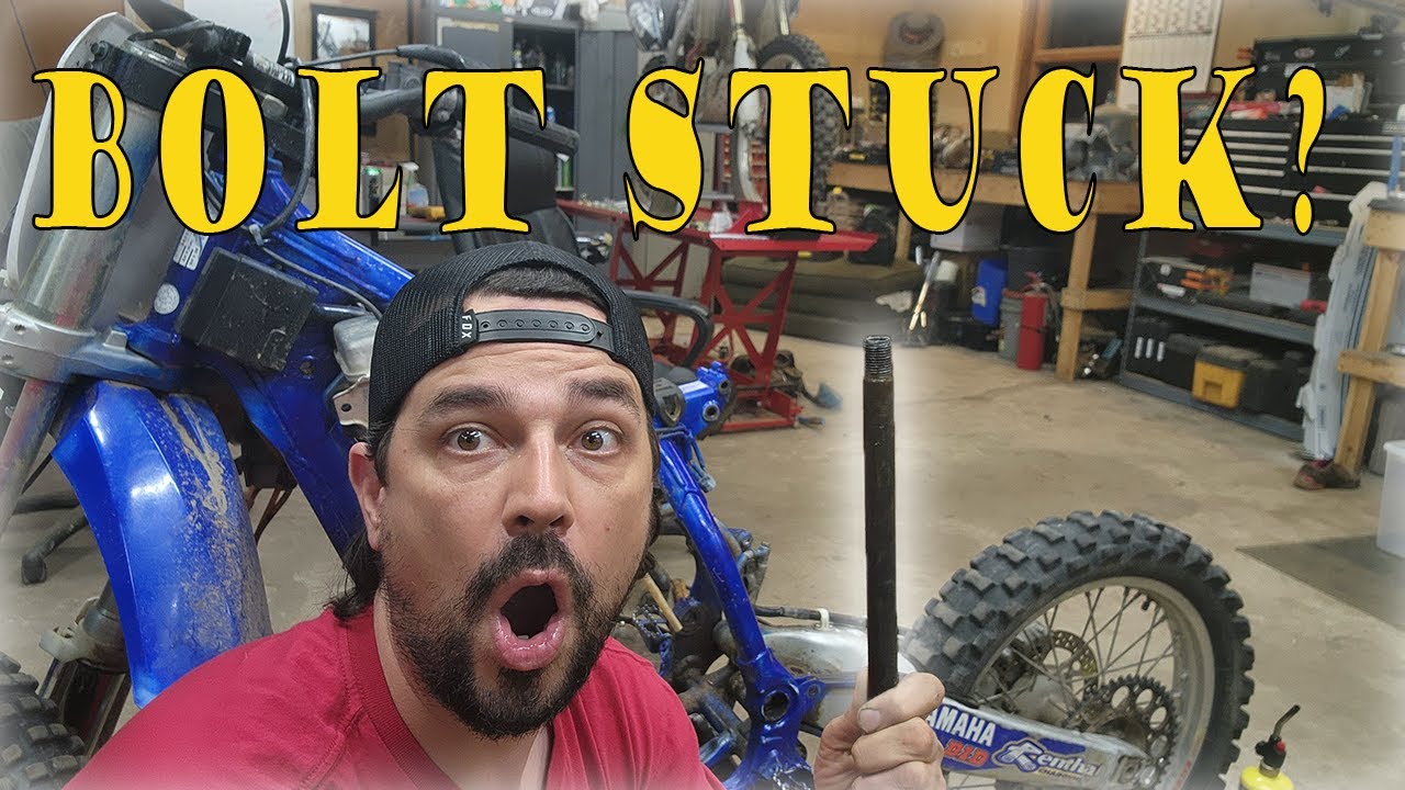 NO PROBLEM! Great Trick on How To get a STUCK Swingarm Bolt Out Without Cutting Drilling or Heating