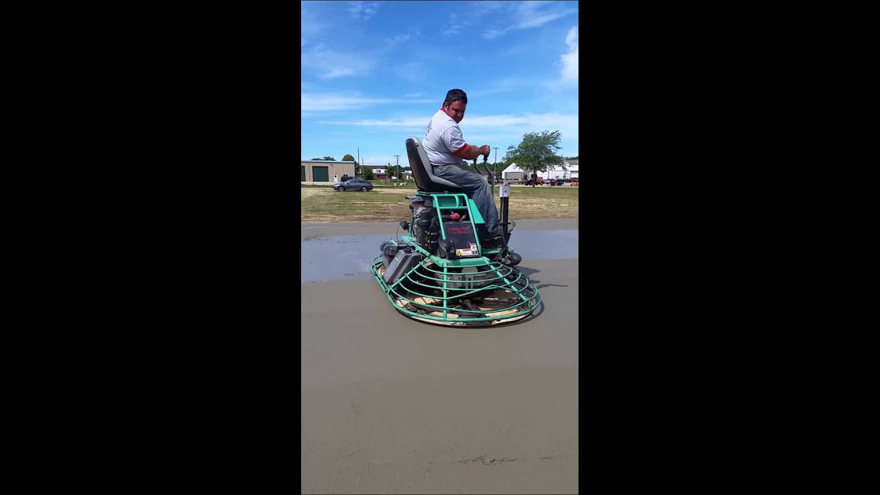 Operating a ride on power trowel with pans(Part 5)