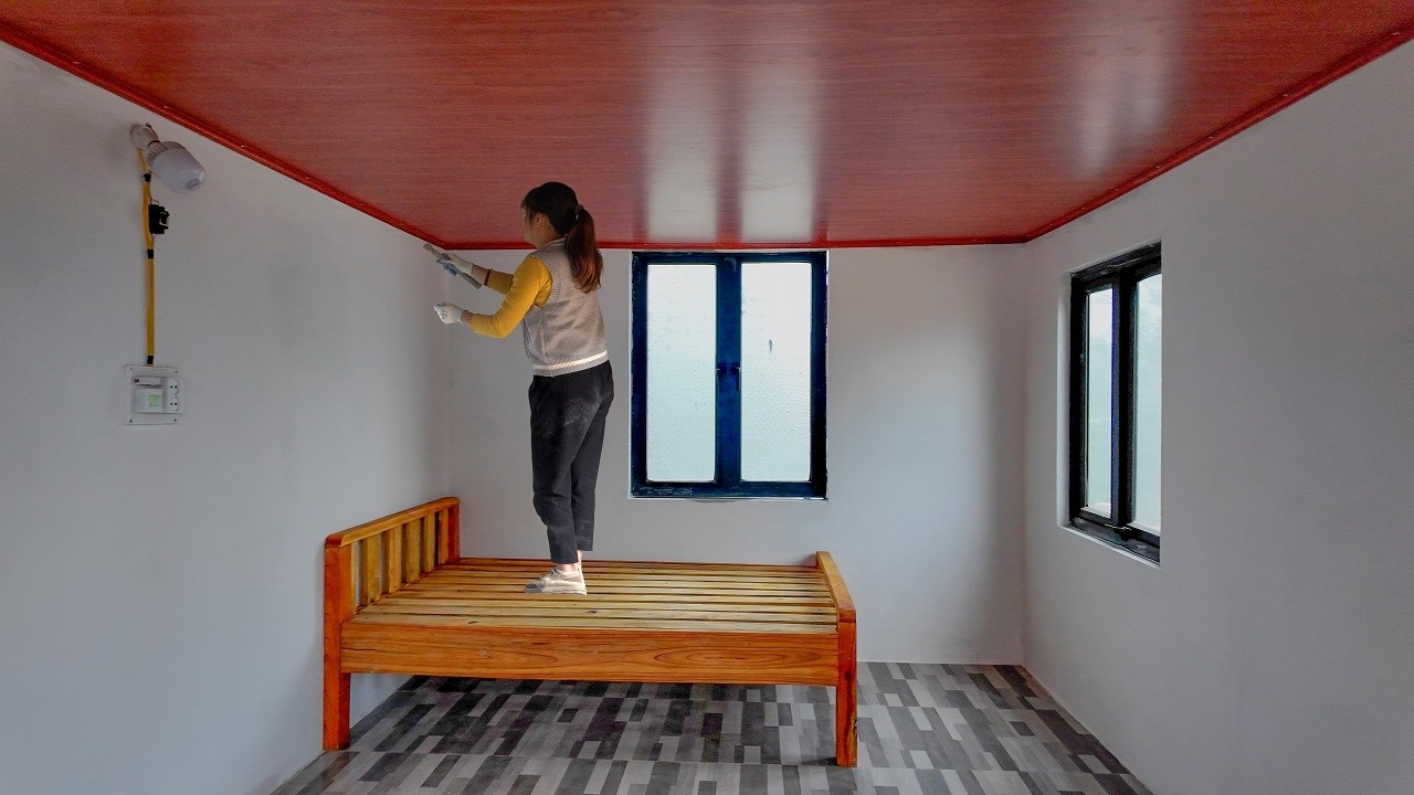 The girl bought plastic sheets and installed them on the ceiling - The room became beautiful.