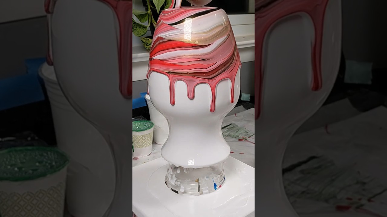 Pink & red tree ring pour on a vase (acrylic paint pour on glass)