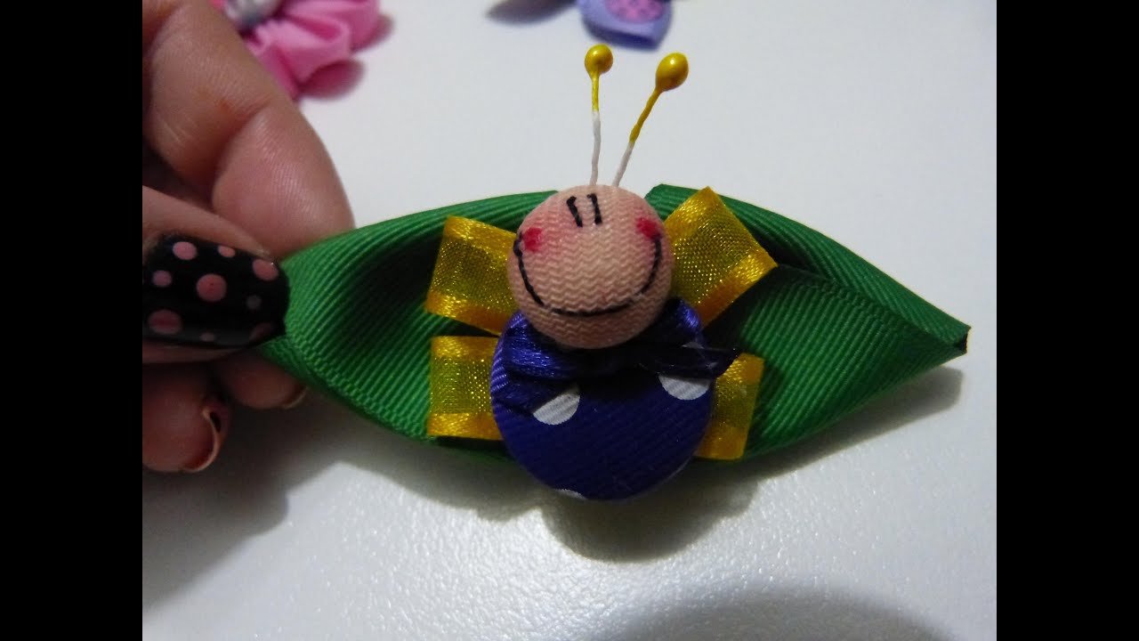 mariposas miniatura elaboradas con botones. bows with butterfly hair