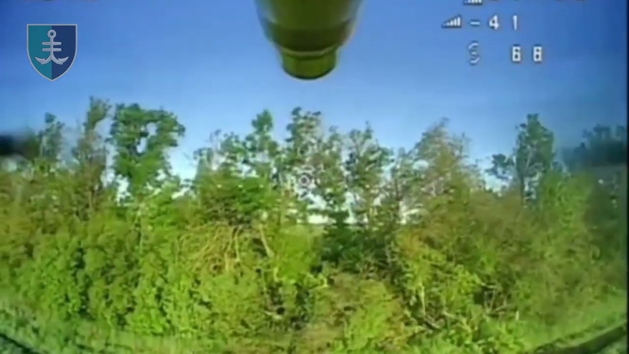 Ukraine - 13.05.2025. FPV Of The The 35th Marine Brigade Hits A RuAF Tank Hidden In The Tree Line.