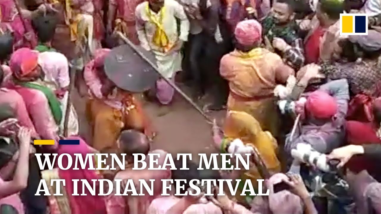 Women hit men with sticks at traditional Indian festival celebration