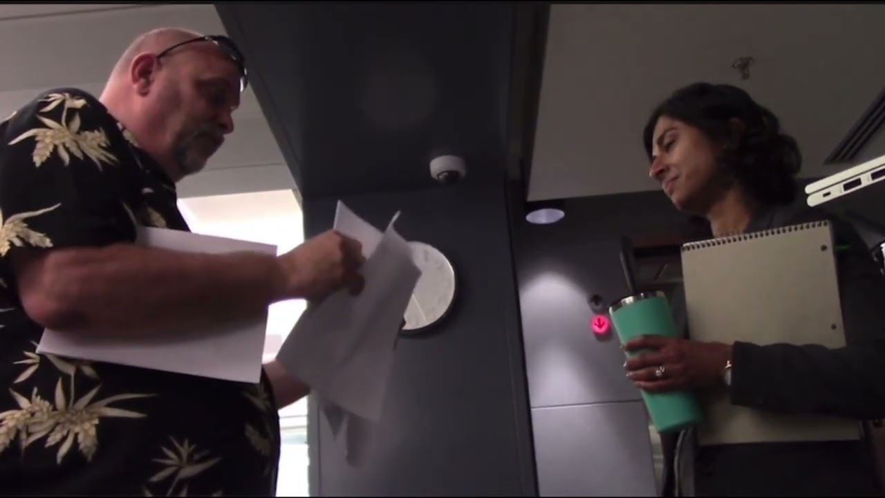 Gotcha! County Counsel Served on Camera