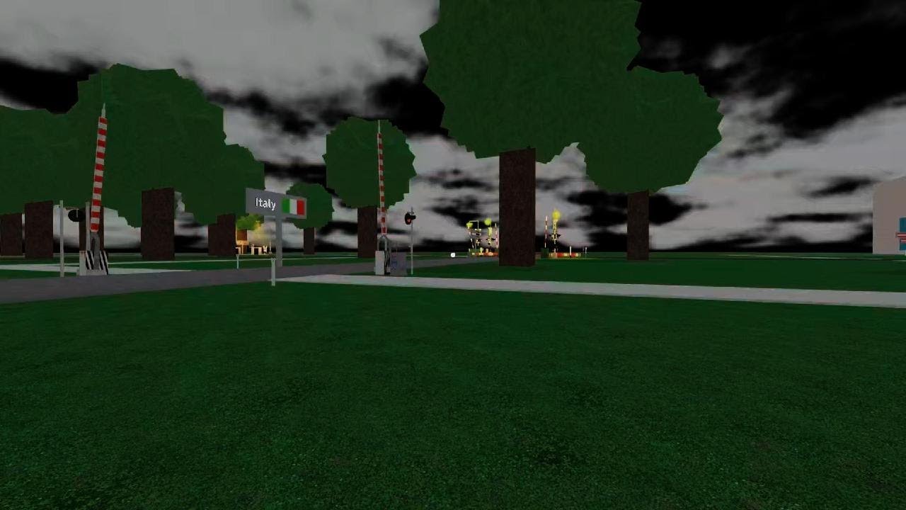 Treno NS al passaggio a livello italiano