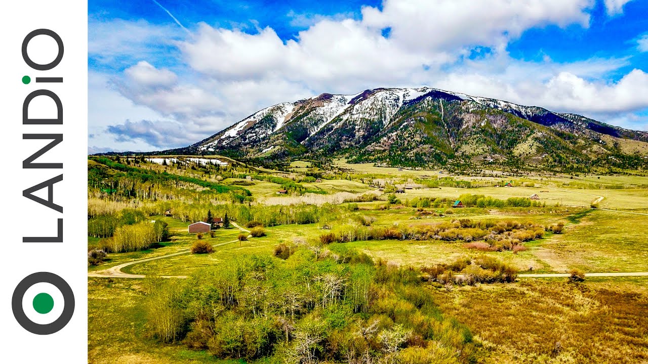 SOLD by LANDiO • Wyoming Land with Mountain Views bordering Creek & Maintained Road