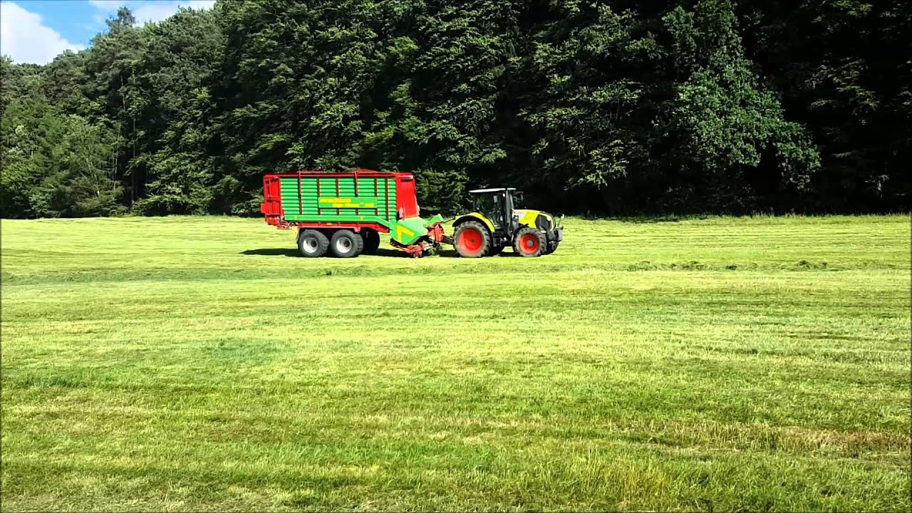 2 Schnitt 2015 Laden mit Claas Arion 530 und Strautmann Mega Vitesse 3401 und Claas Arion 420