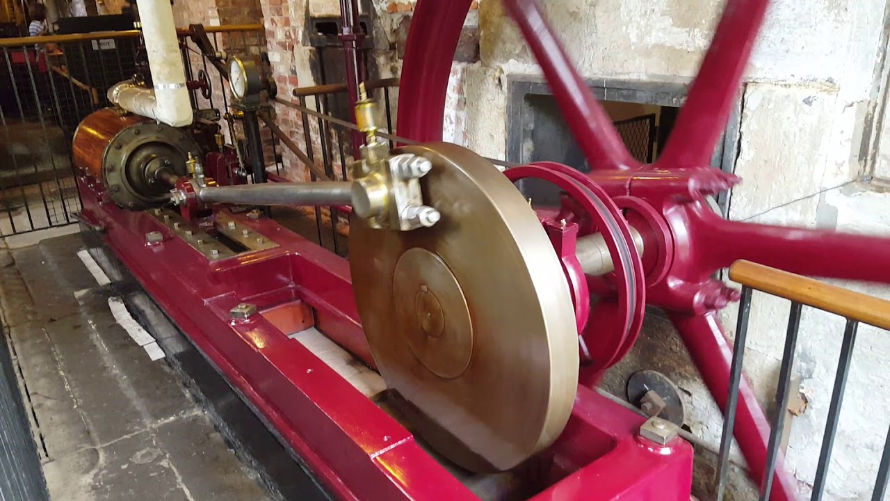 Steam engine on display at quarry bank mill in style near Manchester