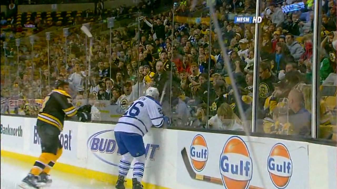 Milan Lucic hits Mike Van Ryn through the glass [HD]
