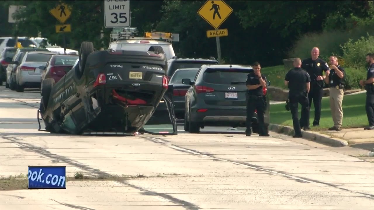 Greenfield Police squad car involved in rollover accident during police chase