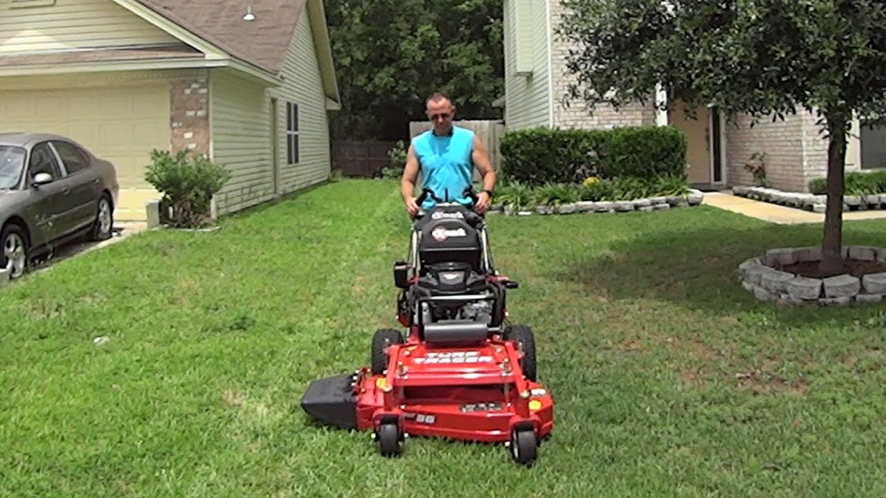 Cutting Grass with the eXmark Turf Tracer 36 Inch Walk Behind Lawn Mower