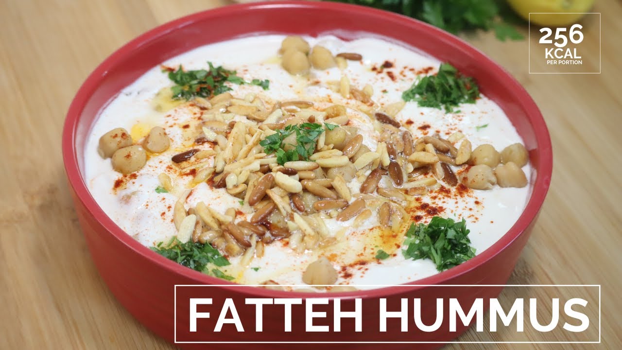 Fatteh hummus - chickpeas with pita bread and yogurt -fatteh homos with arabic  bread  فتة حمص