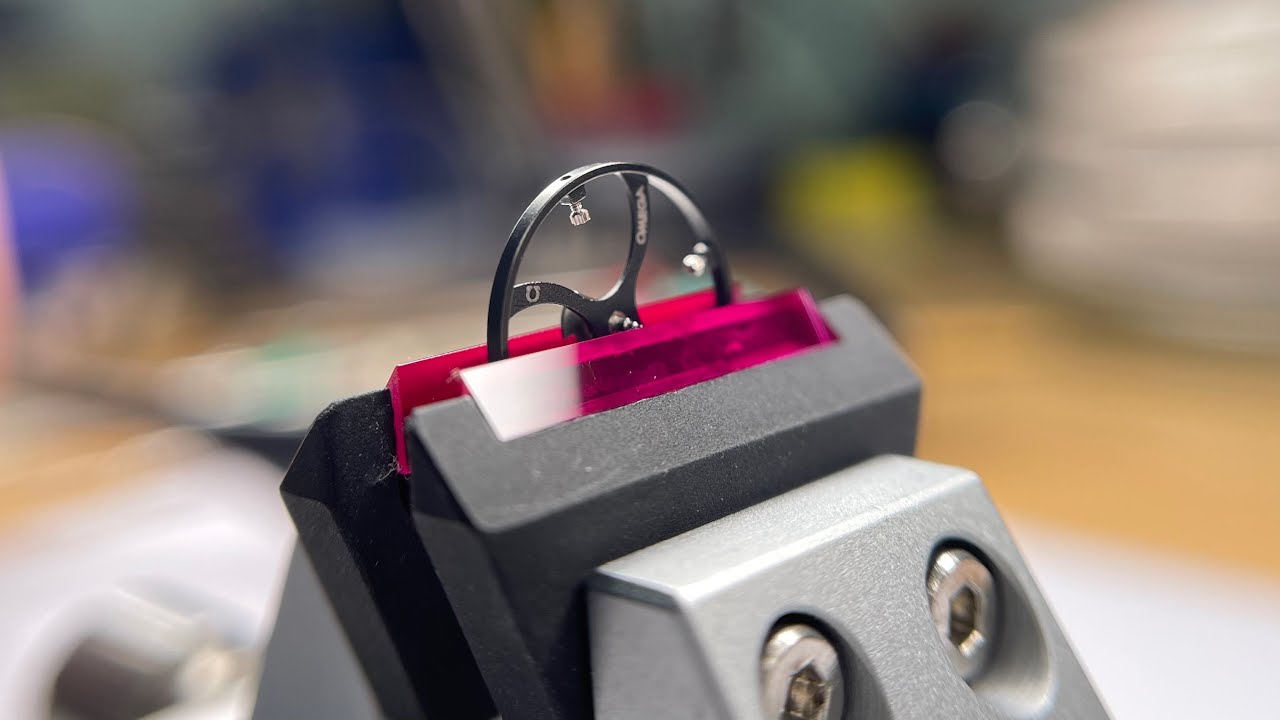 How to use a WATCHMAKERS lathe to repair a broken OMEGA balance?