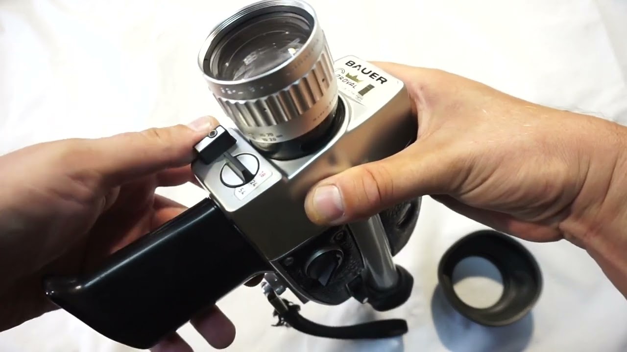 Bauer C Royal loading Super 8 film and batteries on Super 8 camera Bauer C Royal + ON SALE