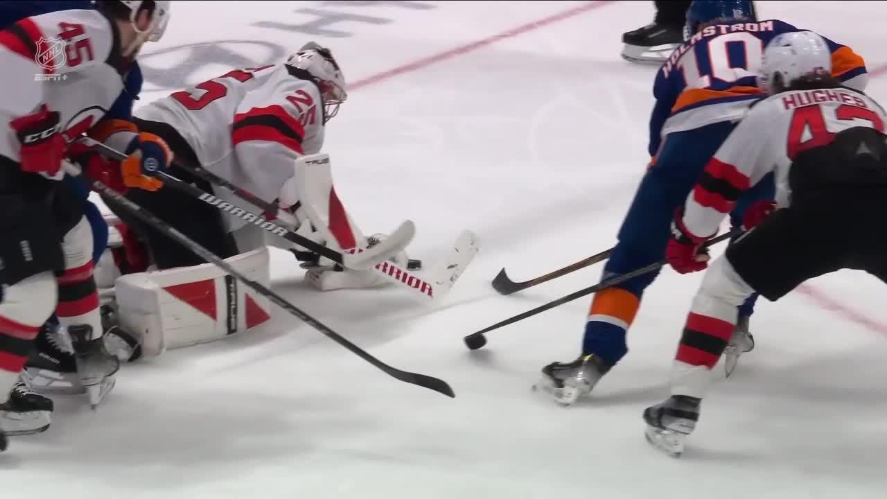 Simon Holmstrom scores a goal against the New Jersey Devils